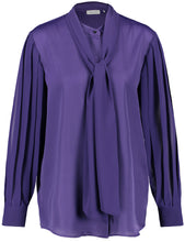 Flowing Blouse with a Tie