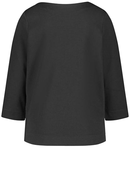 Top with Floral Embellishment